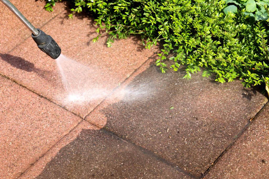 pressure-washer-washing-slabs-in-miami